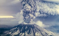 Mount St. Helens ash column. Black flows on the slopes are lahars. (Photo: USGS)